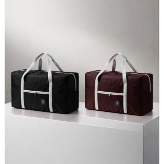 Wind blows travel bag